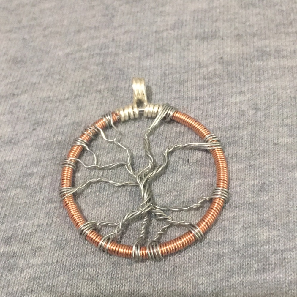 Handcrafted infinity tree pendant